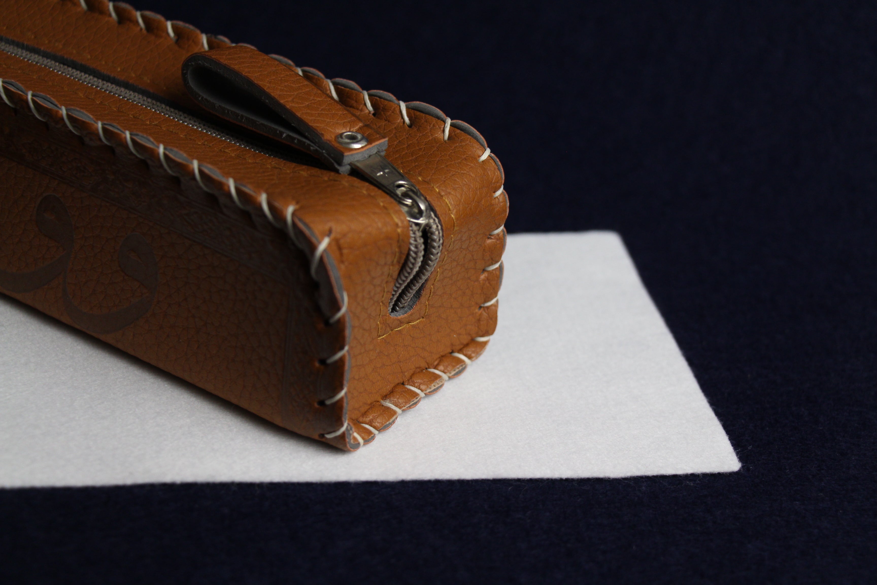 Faux leather case decorated with Arabic calligraphy - brown