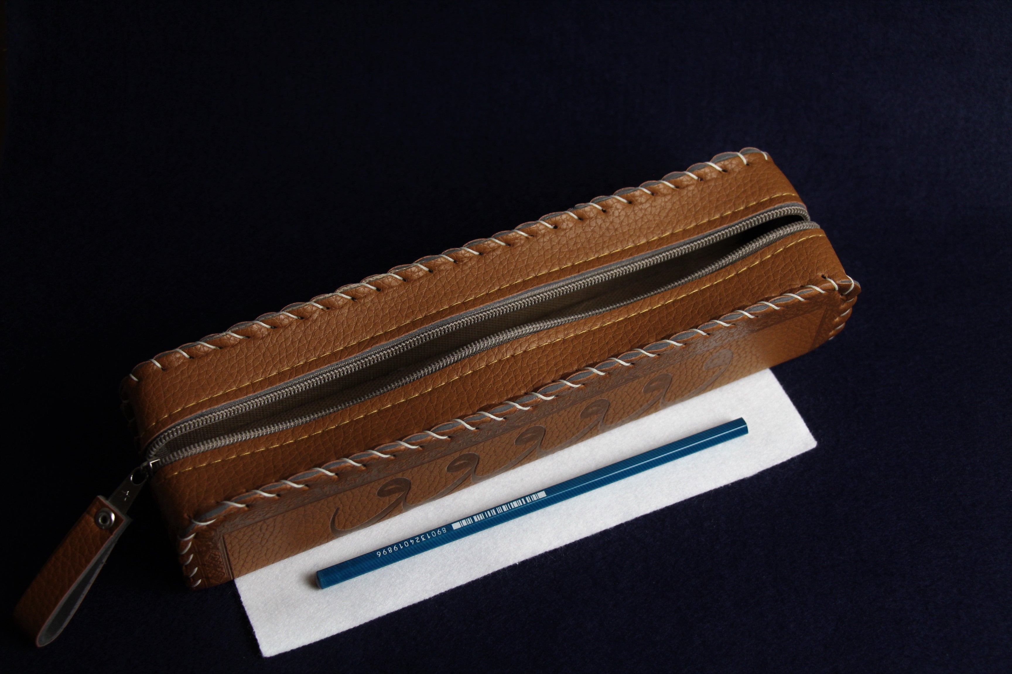 Faux leather case decorated with Arabic calligraphy - brown