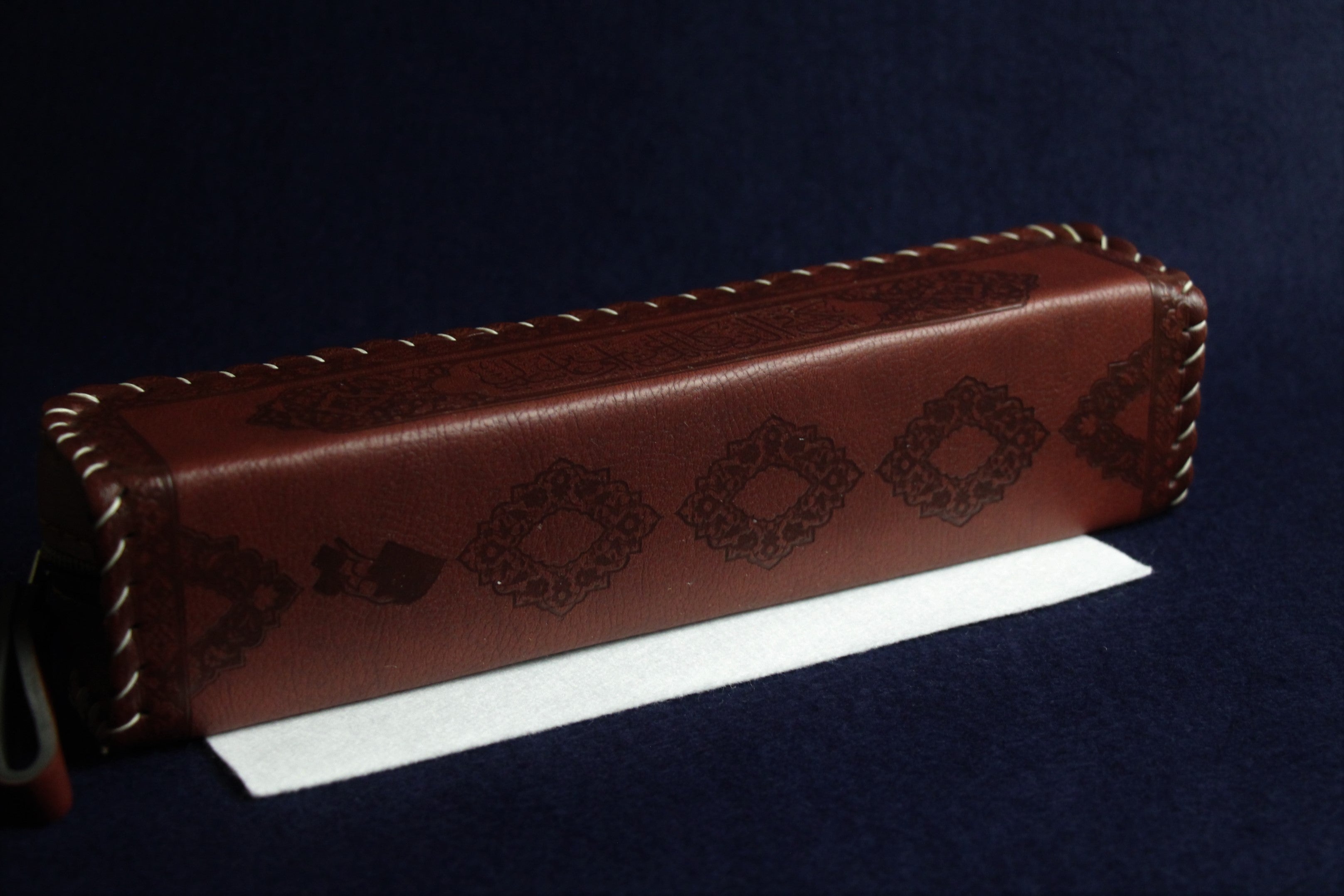 Faux leather case decorated with Arabic calligraphy - purple brown