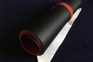 Double-sided black/red faux leather writing mat: 30 x 60 cm