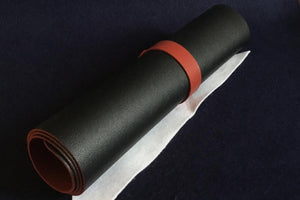 Double-sided black/red faux leather writing mat: 30 x 60 cm